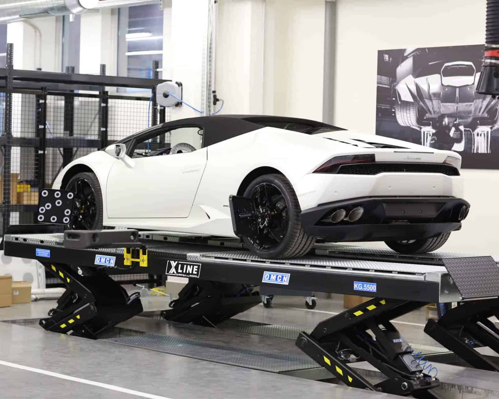 White Lamborghini on an OMCN X-Line scissor lift